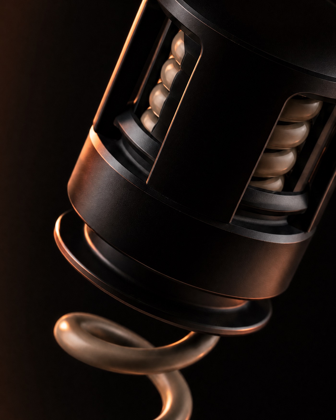The Syn-R1 electrode in close view, spring and housing lit from the side